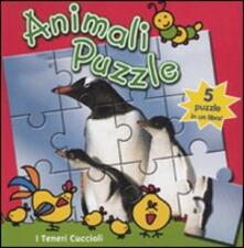 I teneri cuccioli. Animali puzzle.pdf